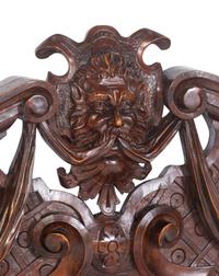 A Pair of Italian Baroque Style Carved Walnut Benches