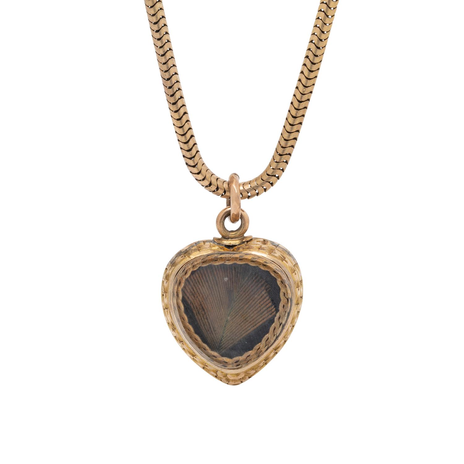 ANTIQUE, YELLOW GOLD AND GARNET PENDANT ON CHAIN