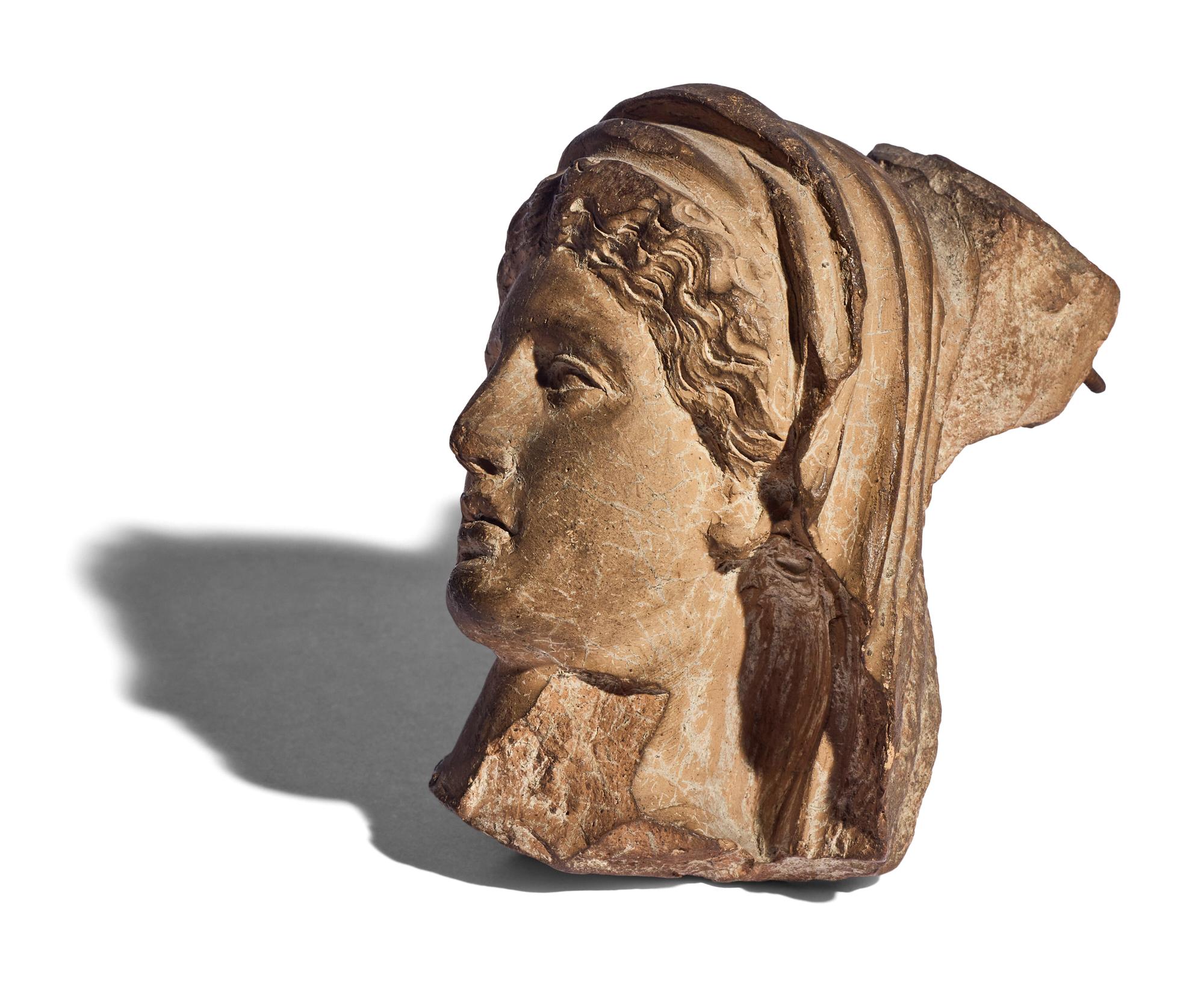 A Greek Terracotta Female Head