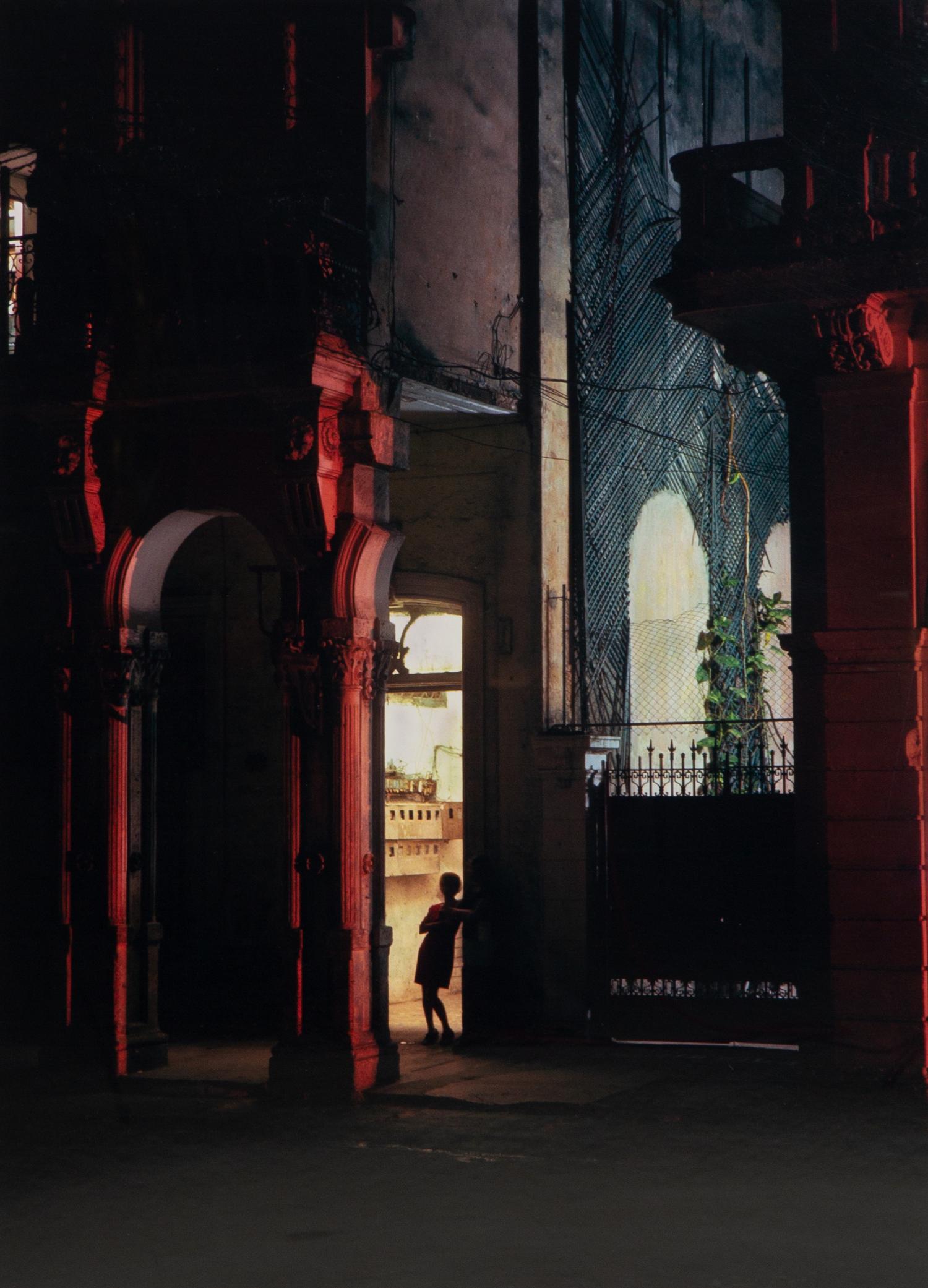 A pair of photographs ( Isabella's Two chairs, 1999; and Woman in Doorway, 1999 )