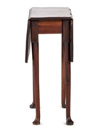 A George III Figured Mahogany Pad-Foot Drop-Leaf Table