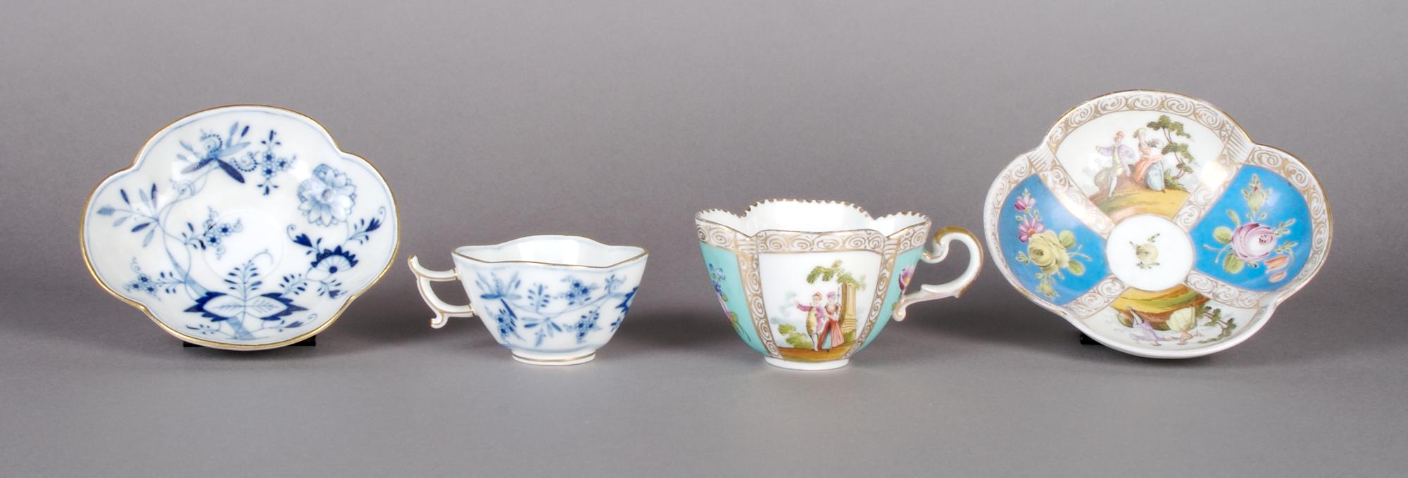 A Meissen Teacup and Saucer, Height of first 2 inches.