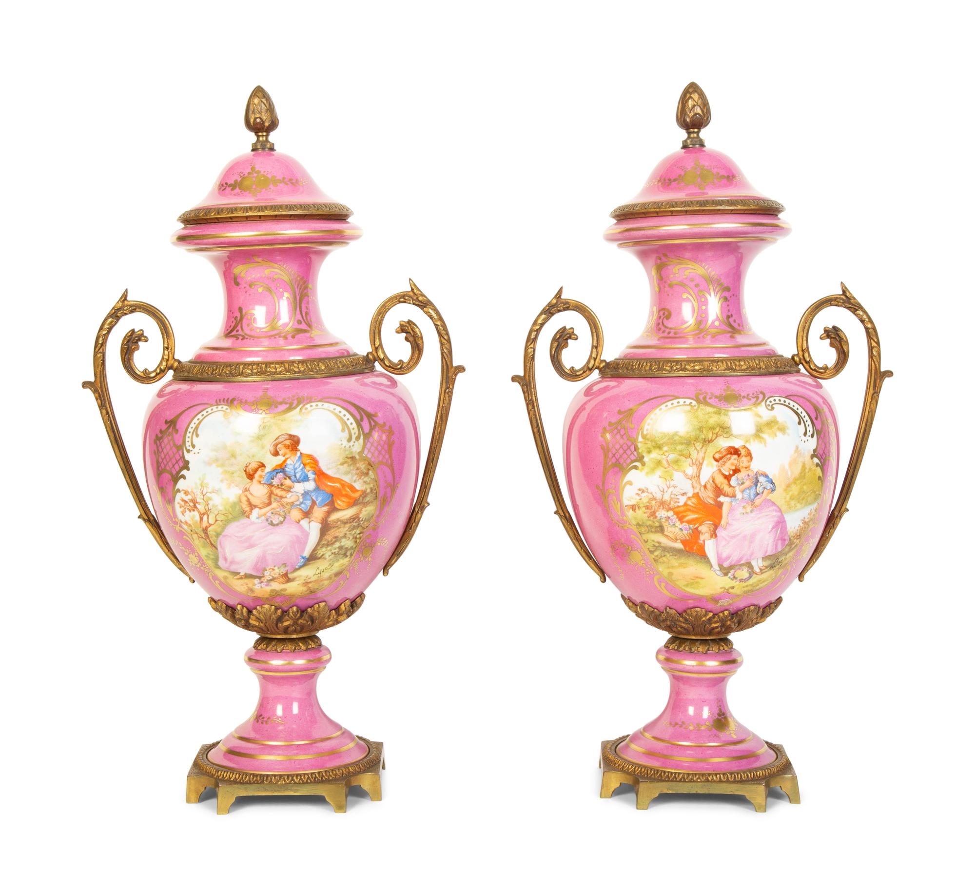 A Pair of French Porcelain Lidded Urns