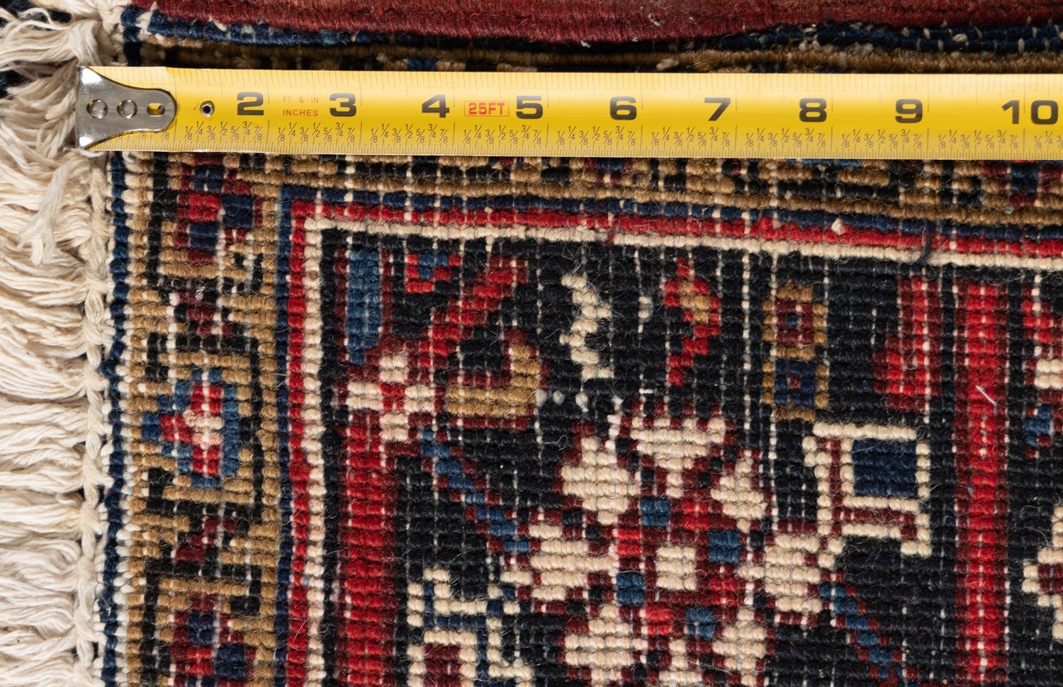 A Heriz Wool Rug