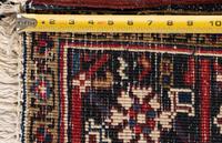 A Heriz Wool Rug