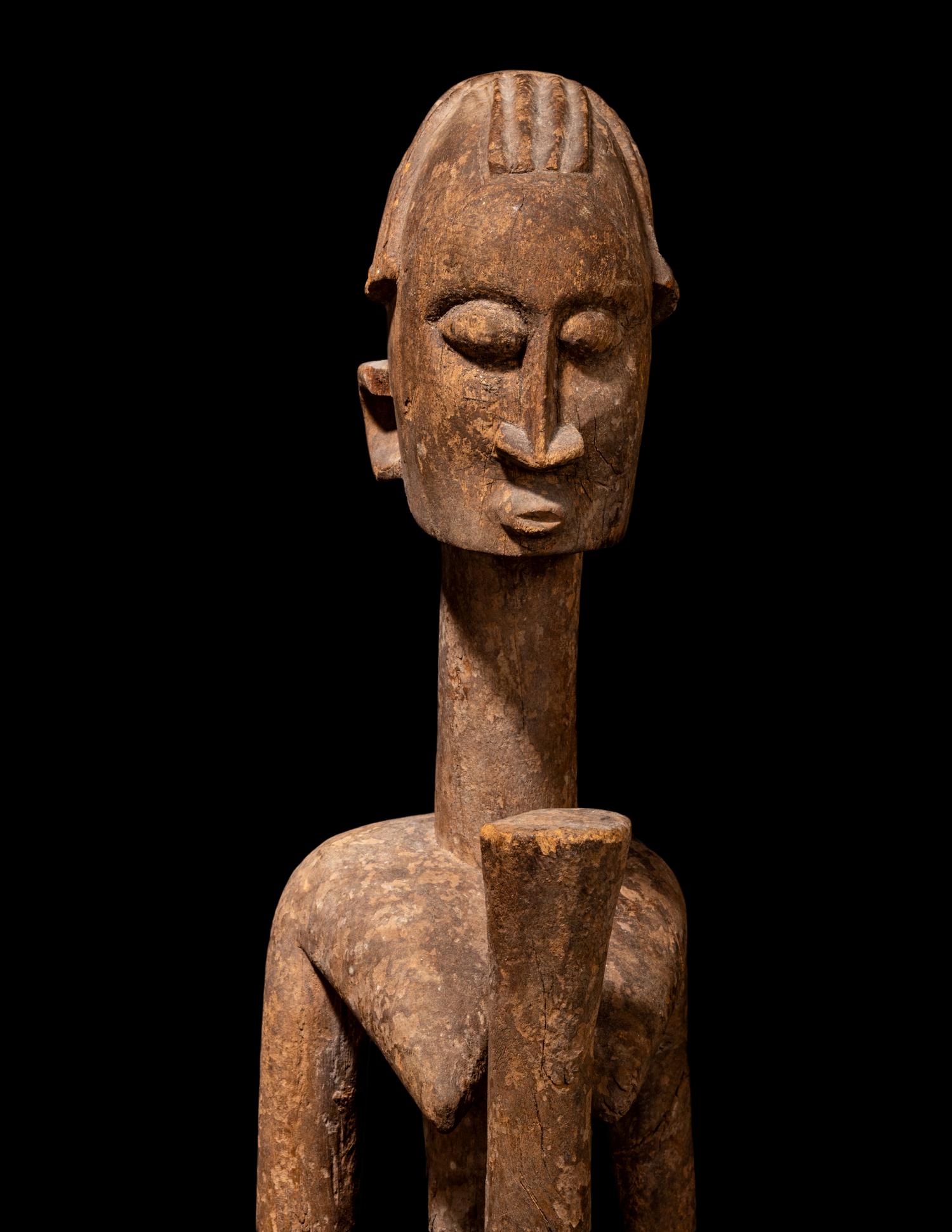 Three Dogan Wood Figures