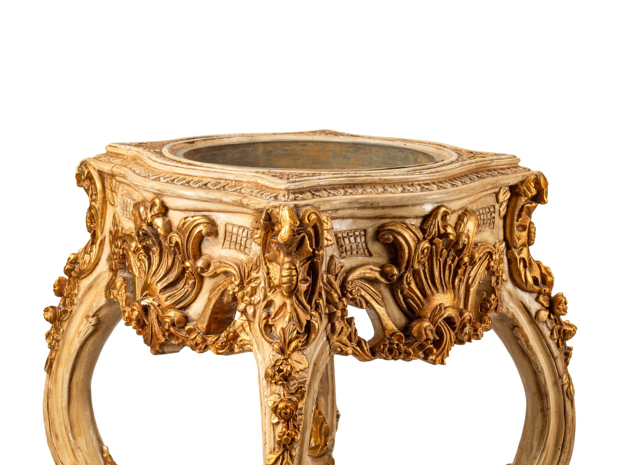 A Pair of Italian Painted and Parcel Gilt Jardinière Stands