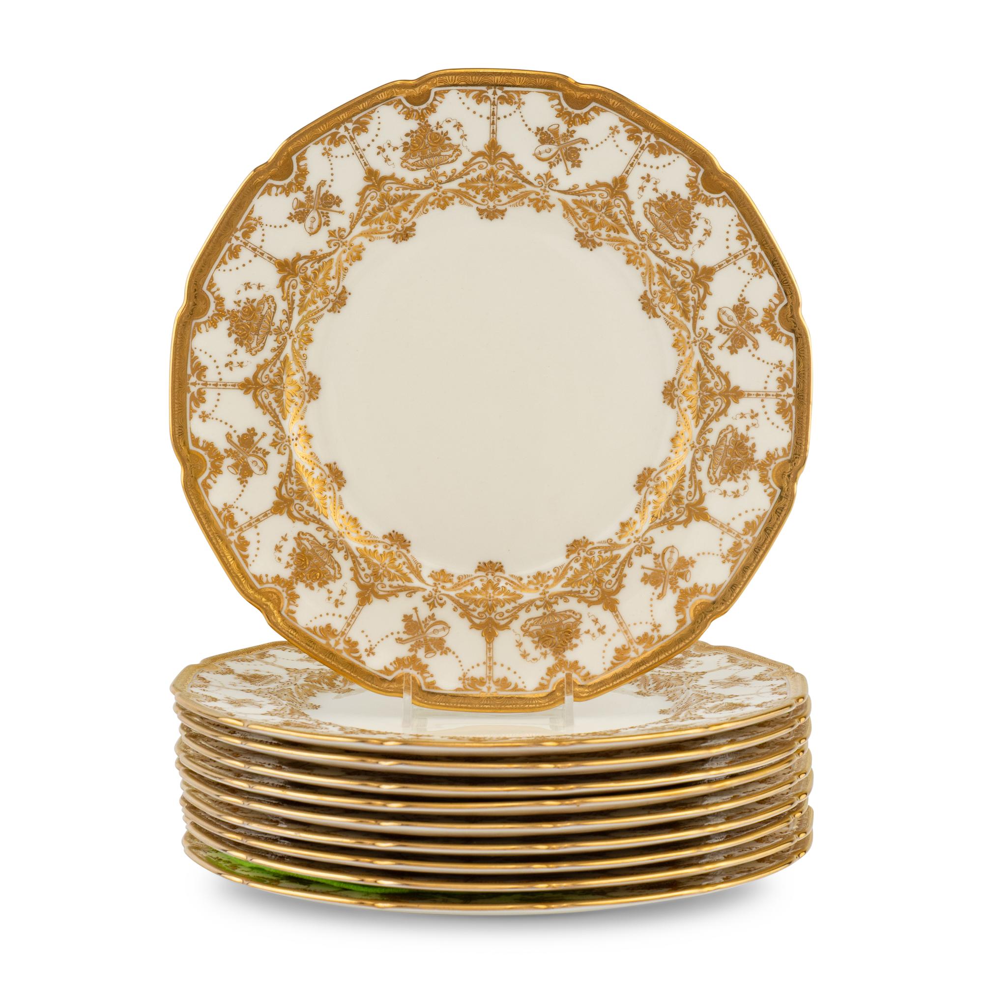 A Set of Ten Royal Doulton Gilt Decorated Porcelain Service Plates