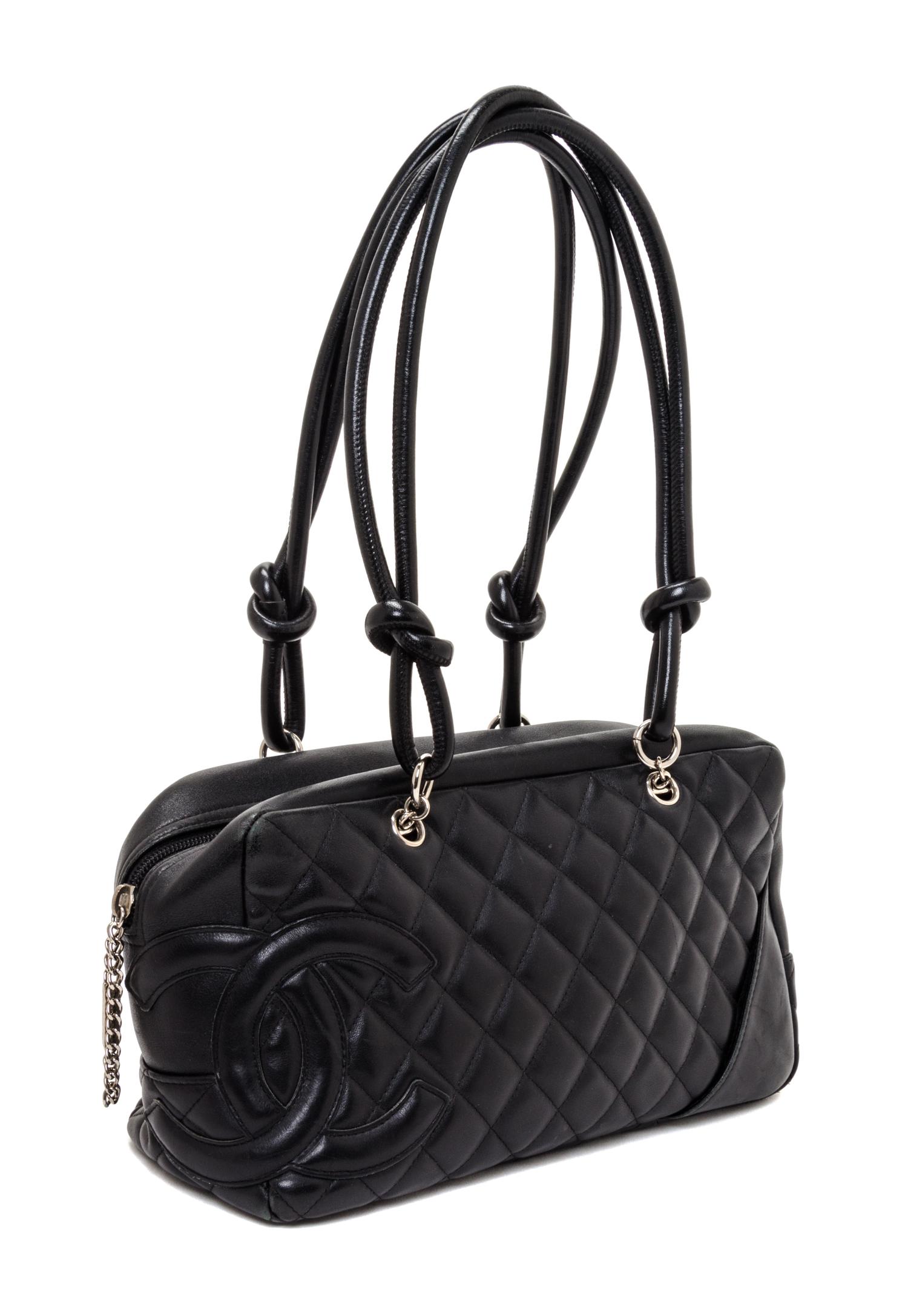 A Chanel Black Quilted Leather Ligne Cambon Bowler Bag, 11" x 6" x 4".