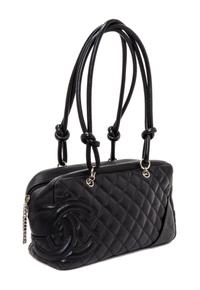A Chanel Black Quilted Leather Ligne Cambon Bowler Bag, 11" x 6" x 4".