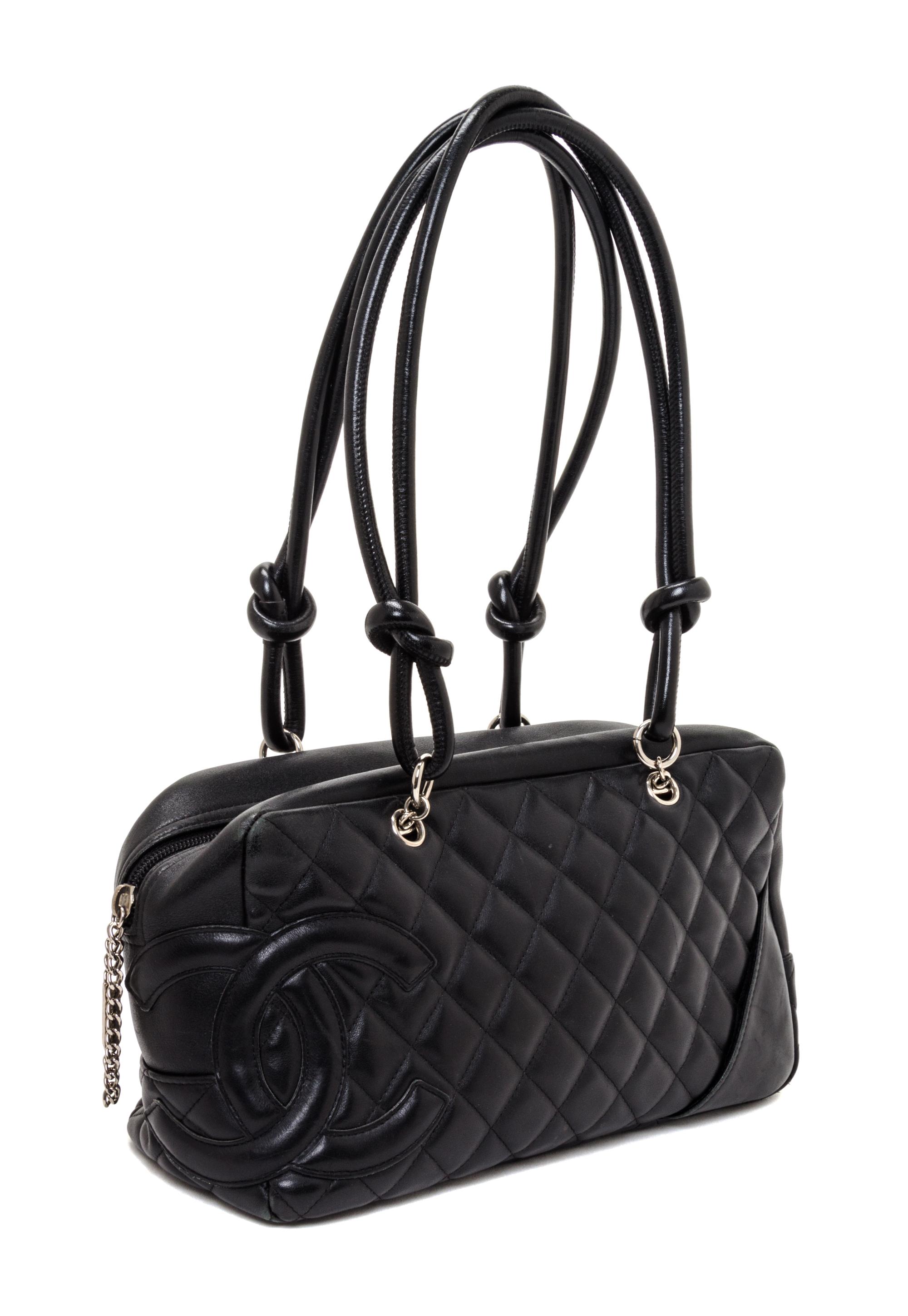 A Chanel Black Quilted Leather Ligne Cambon Bowler Bag, 11" x 6" x 4".