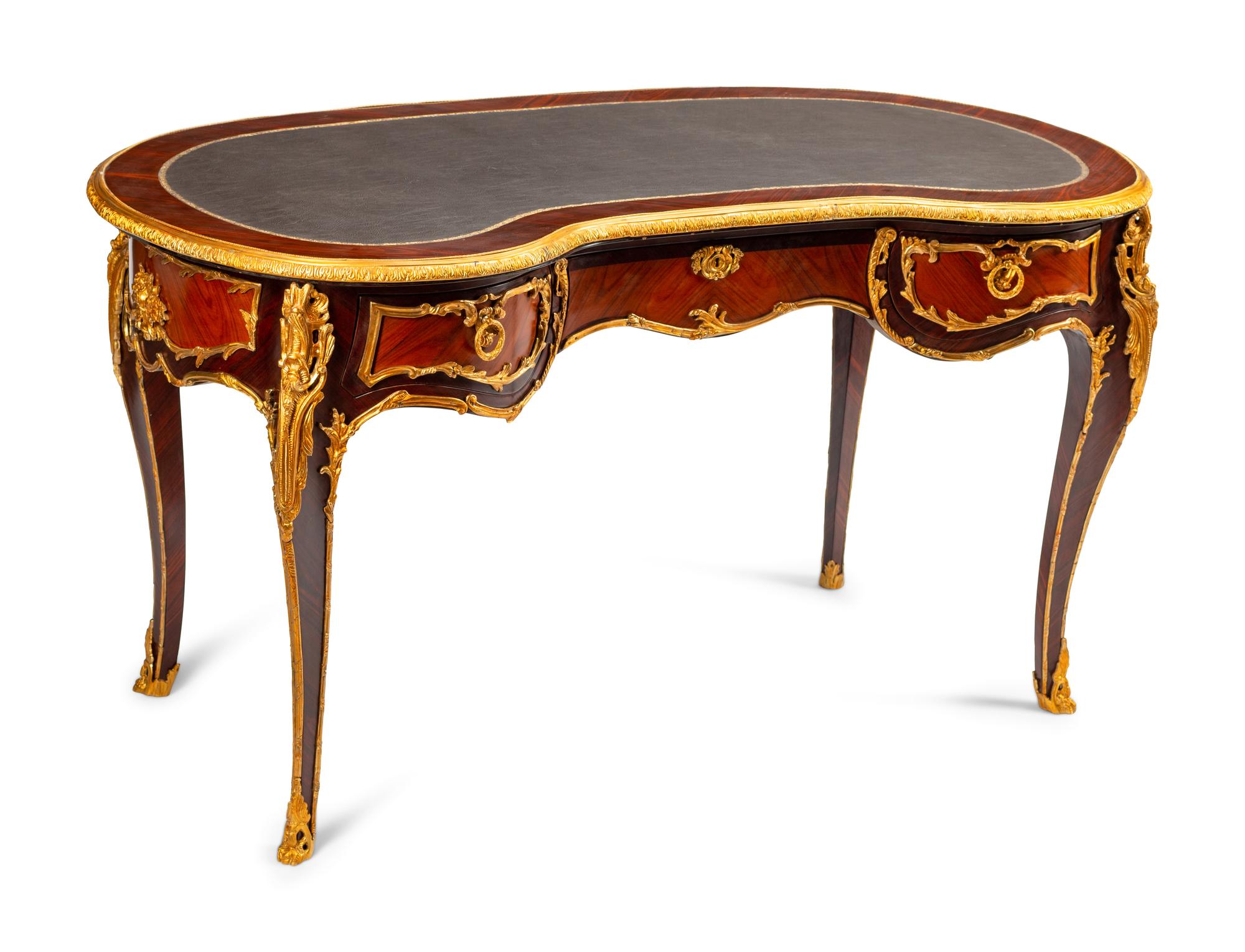 A Louis XV Style Gilt Bronze Mounted Reniform Bureau Plat