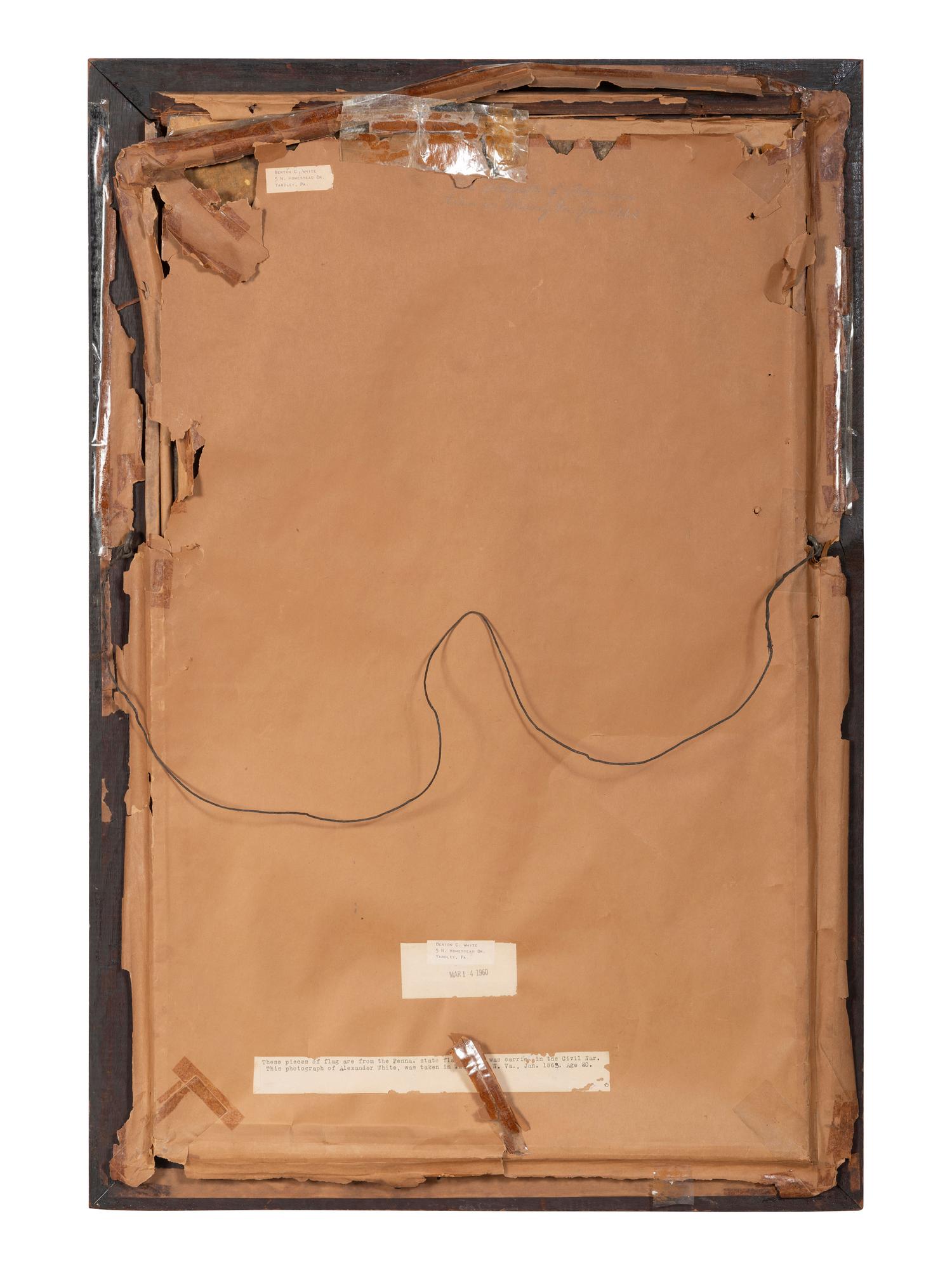 [CIVIL WAR]. Group of artifacts related to Alexander White, 82nd Pennsylvania Volunteer Infantry, including escutcheon, CDV portrait, and flag remnants.