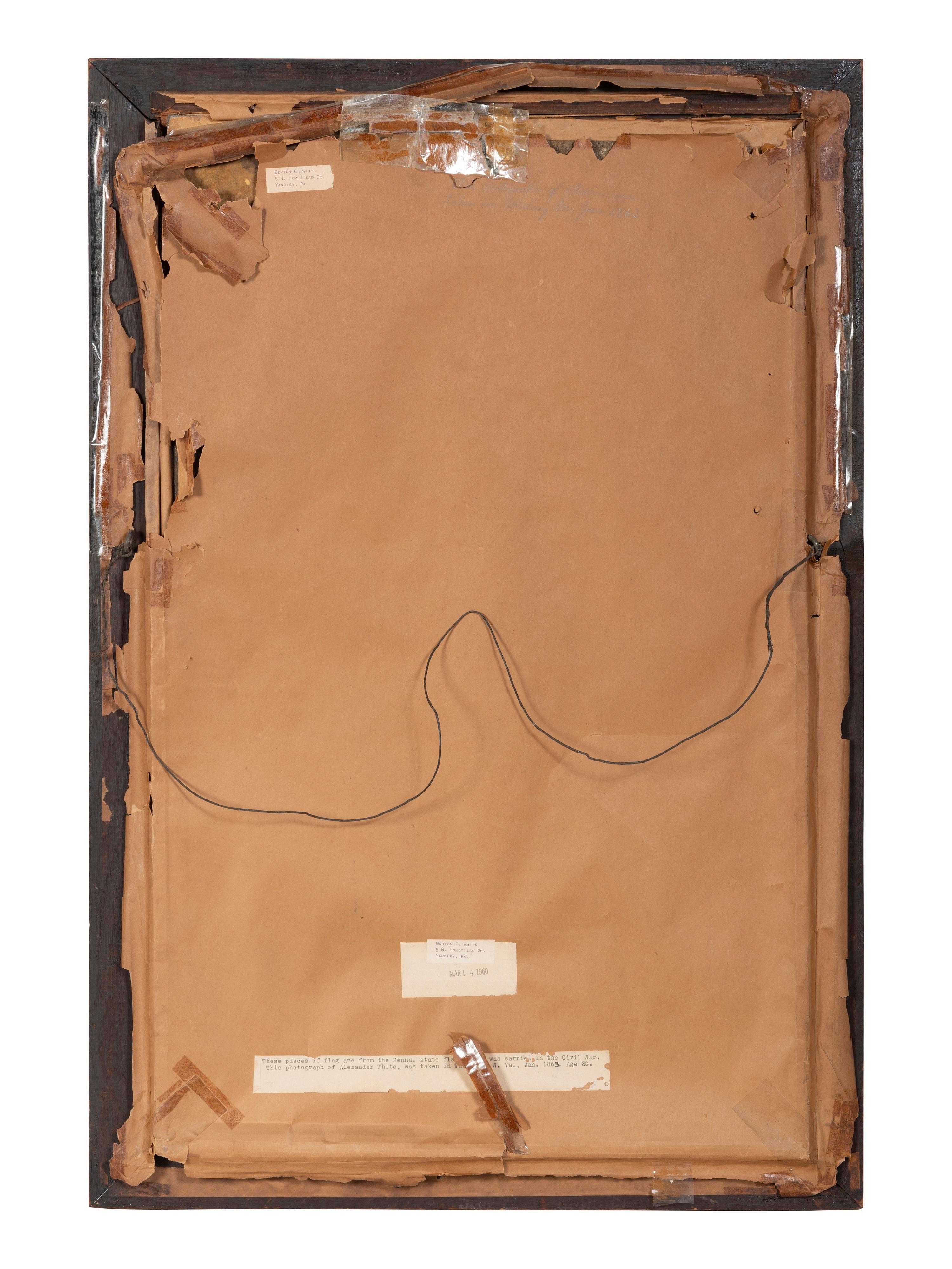 [CIVIL WAR]. Group of artifacts related to Alexander White, 82nd Pennsylvania Volunteer Infantry, including escutcheon, CDV portrait, and flag remnants.