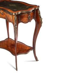 A Louis XV Style Gilt Bronze Mounted Kingwood and Parquetry Writing Table