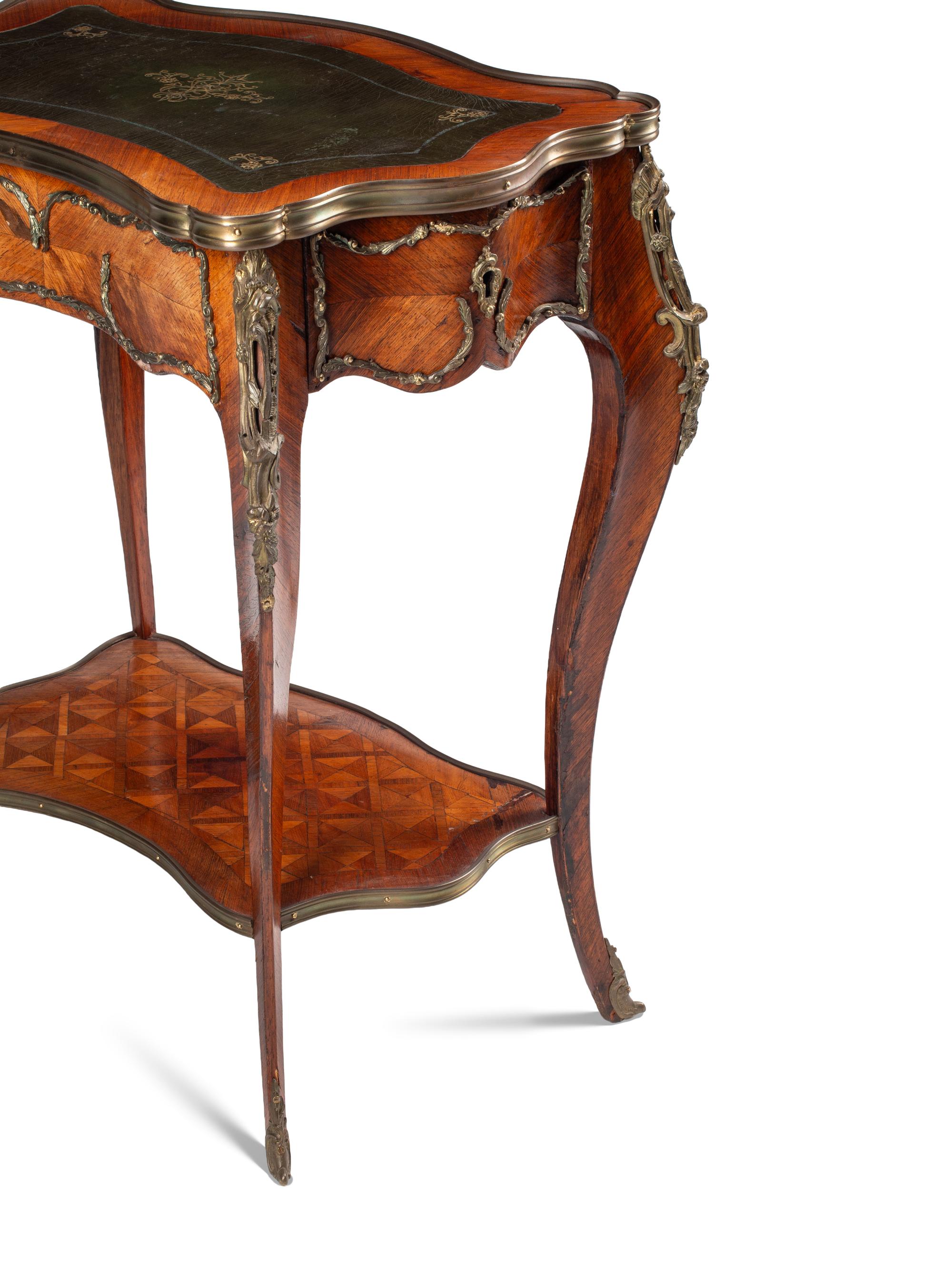 A Louis XV Style Gilt Bronze Mounted Kingwood and Parquetry Writing Table