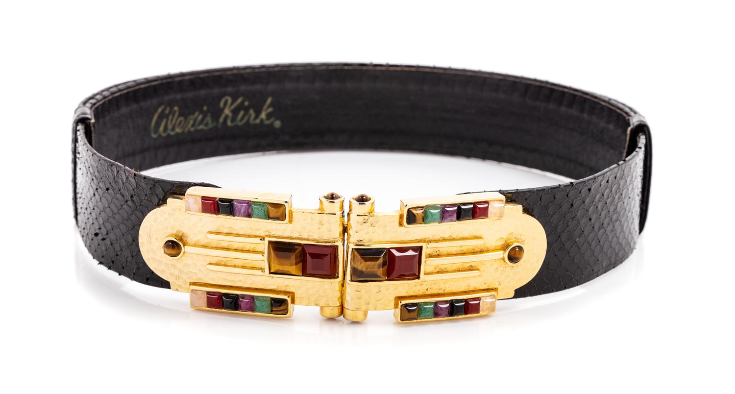 An Alexis Kirk Black Snakeskin Slide Belt, 23" - 36" L x 1.5" W.