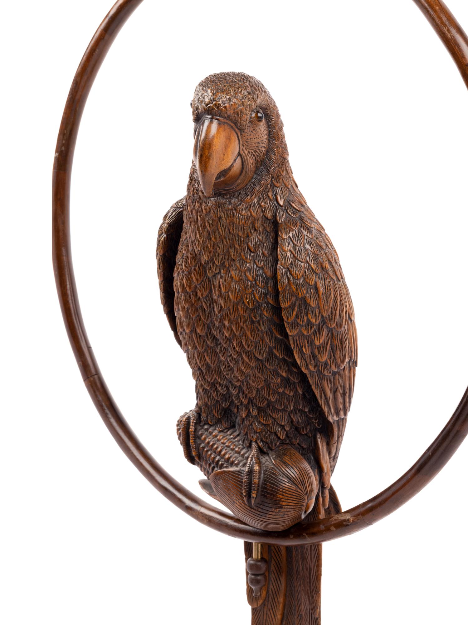 A Black Forest Carved Parrot on Ring Perch Ornament