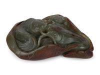 A Chinese Carved Jade Double Carp on Lily Pad — 20TH CENTURY