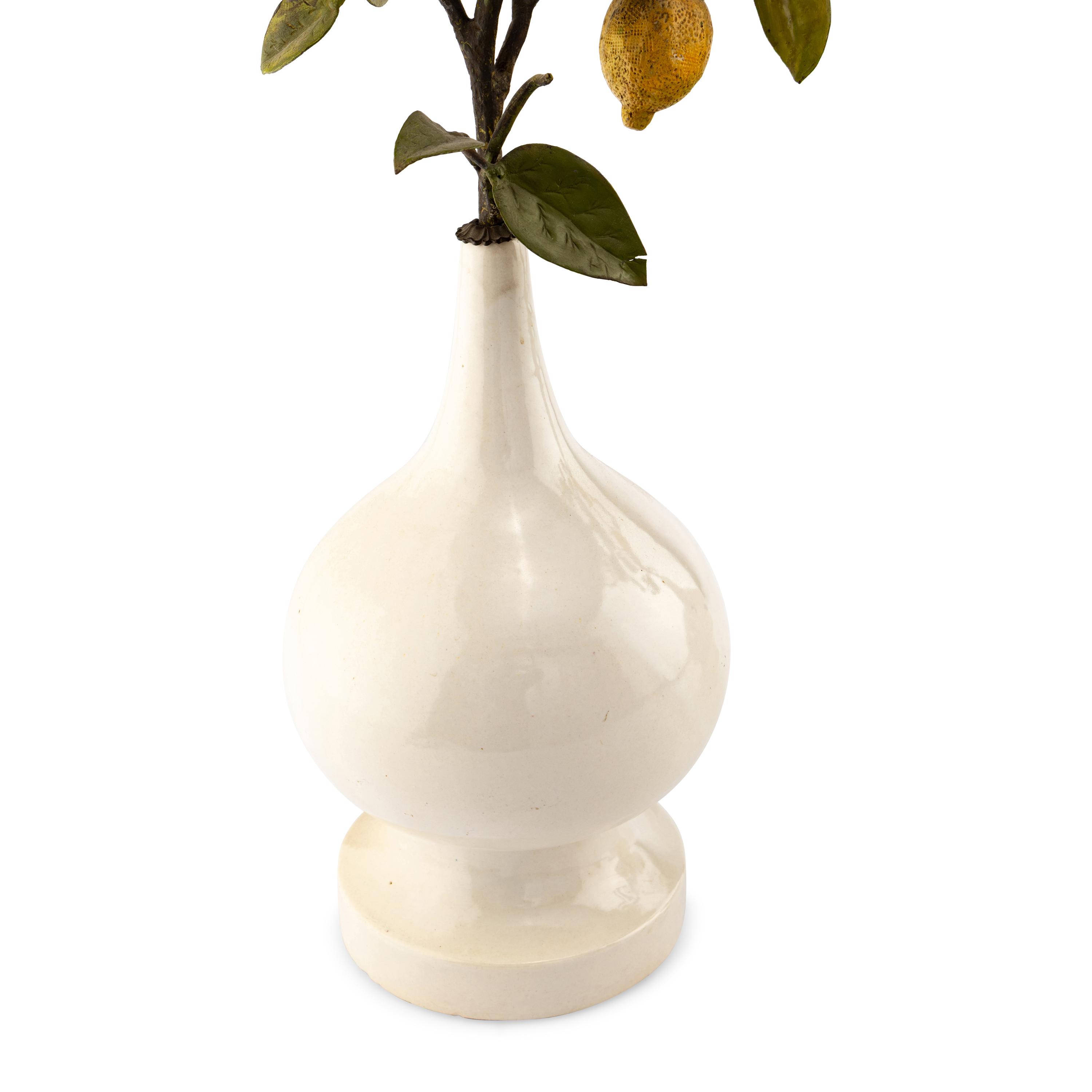 A Pair of White Glazed Earthenware Vases with Painted Tôle Models of Lemon Branches