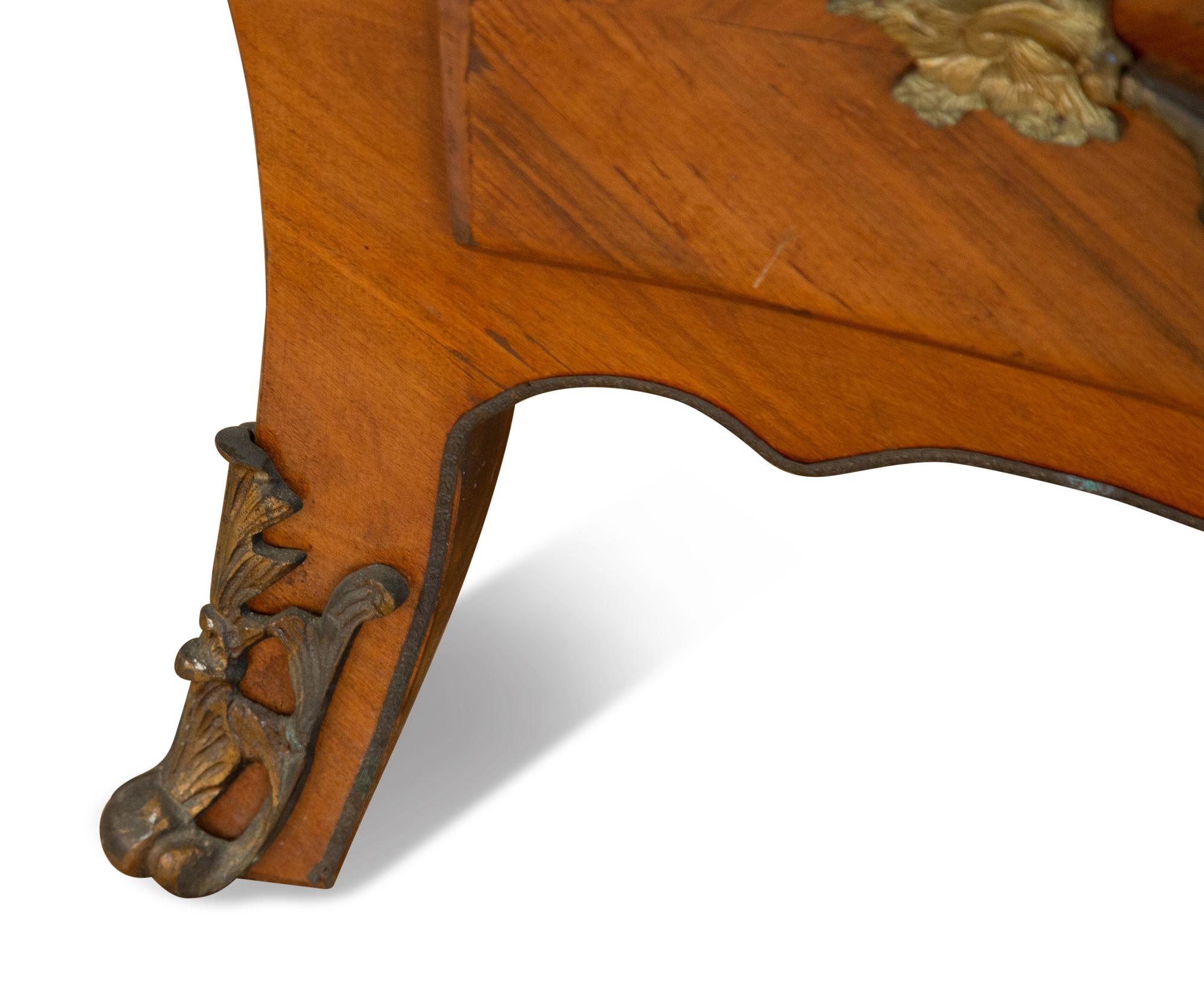 A Pair of Gilt Bronze Mounted Kingwood Bombe Commodes