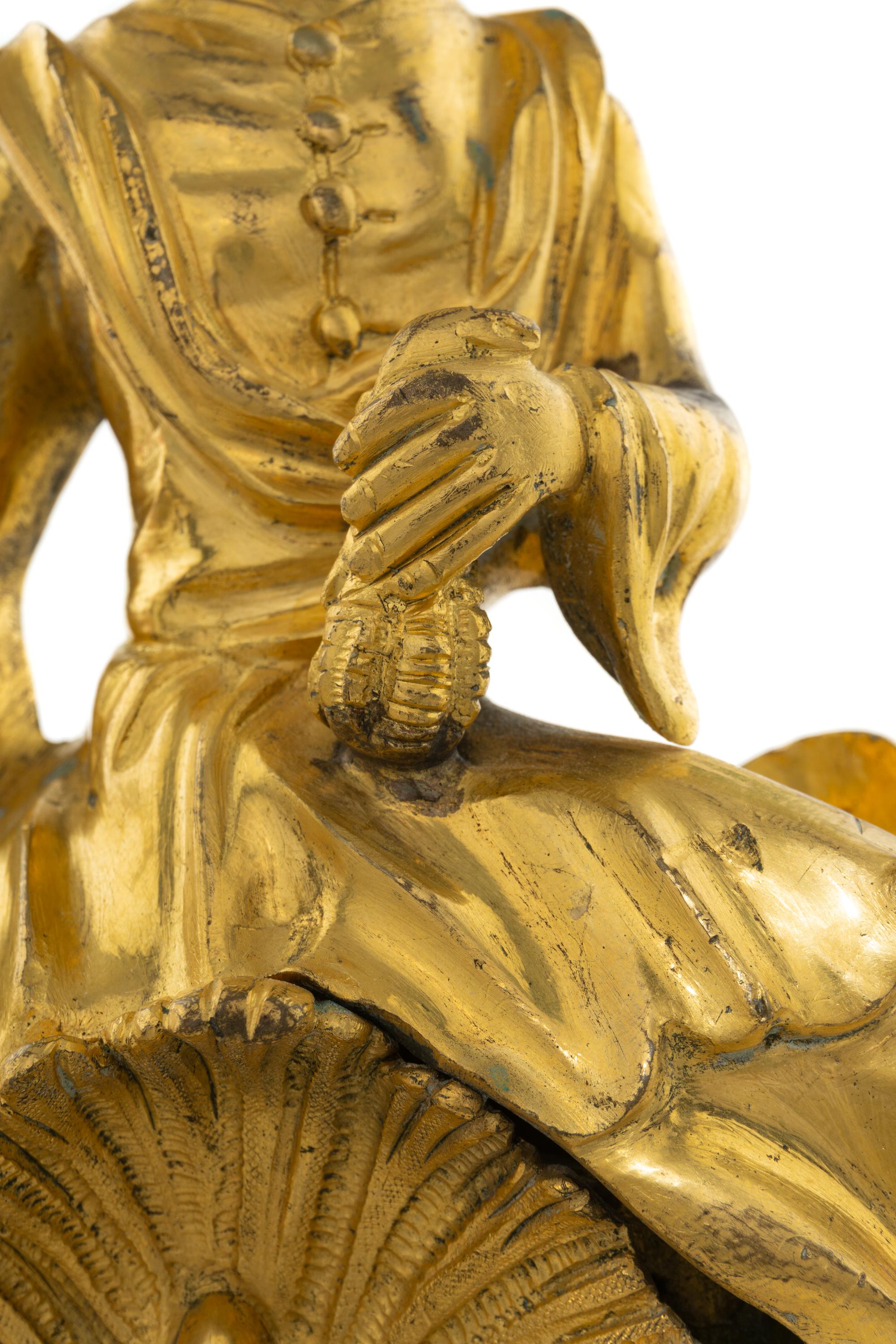 A Pair of French Gilt Bronze Chenets