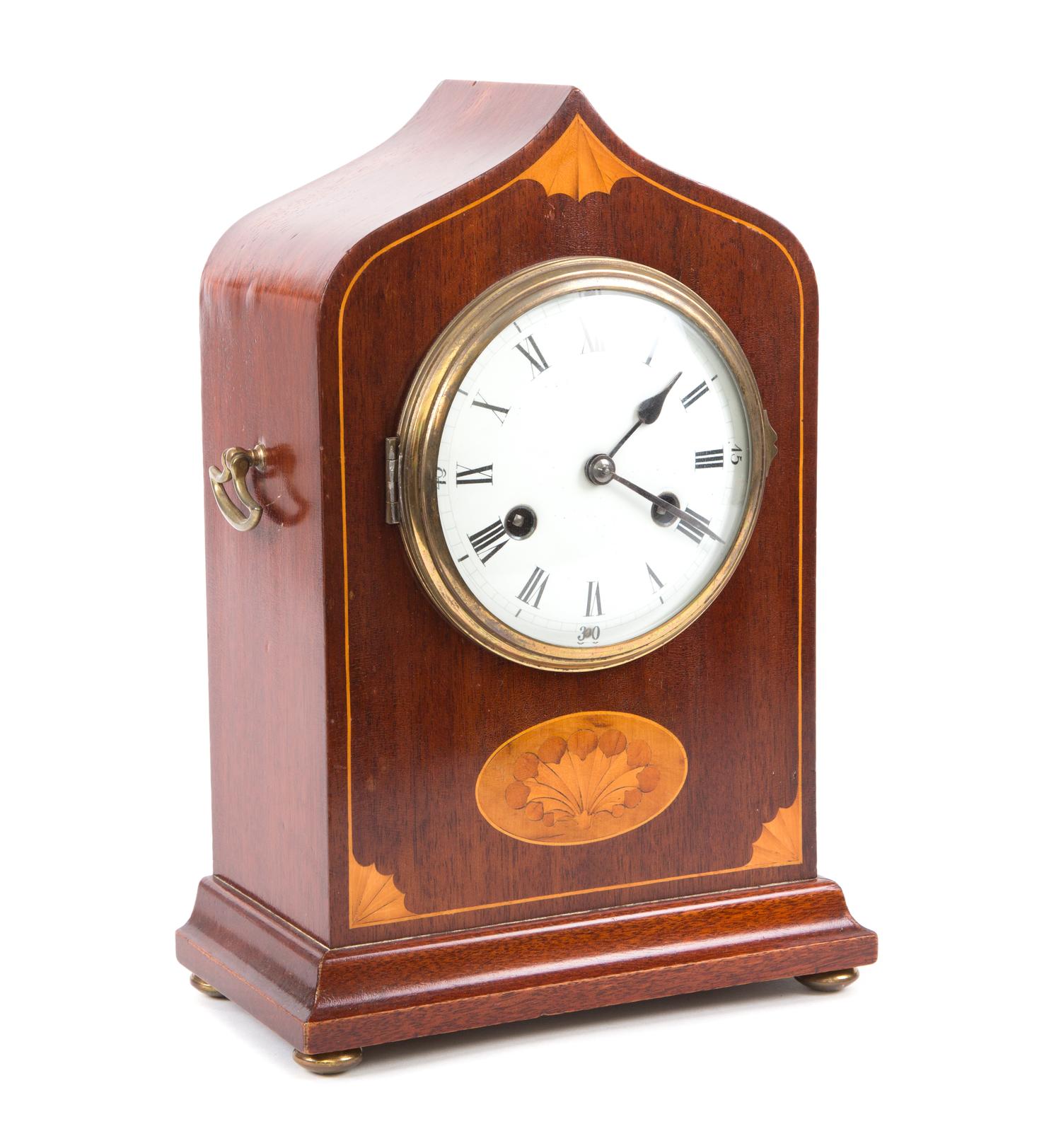 An English Inlaid Mahogany Lancet Clock Height 13 1/2 x width 9 1/4 x depth 5 inches. — LATE 19TH/EARLY 20TH CENTURY