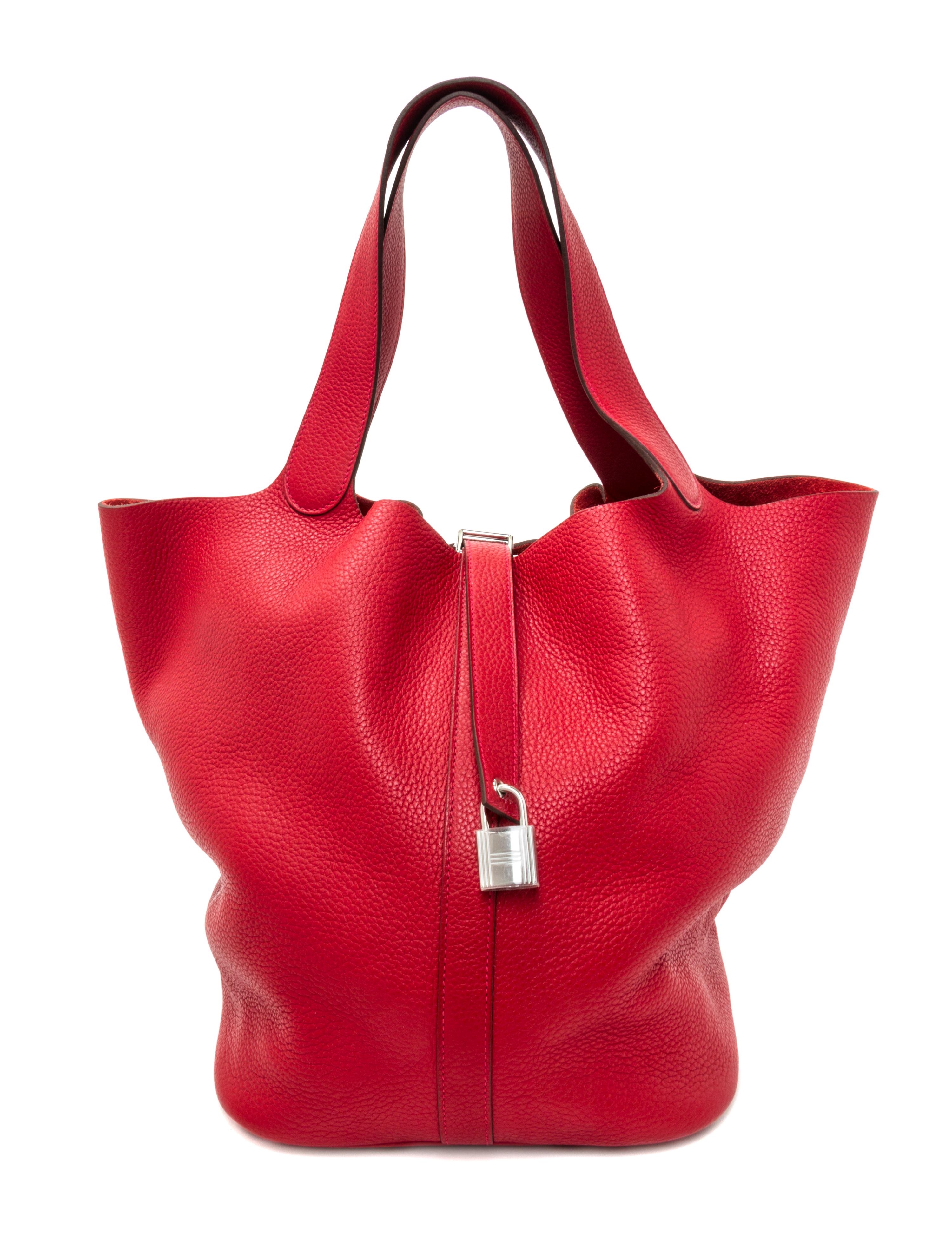 An Hermes Rouge Casaque Taurillon Clemence Picotin Lock TGM Handbag, 13" x 13" x 9".