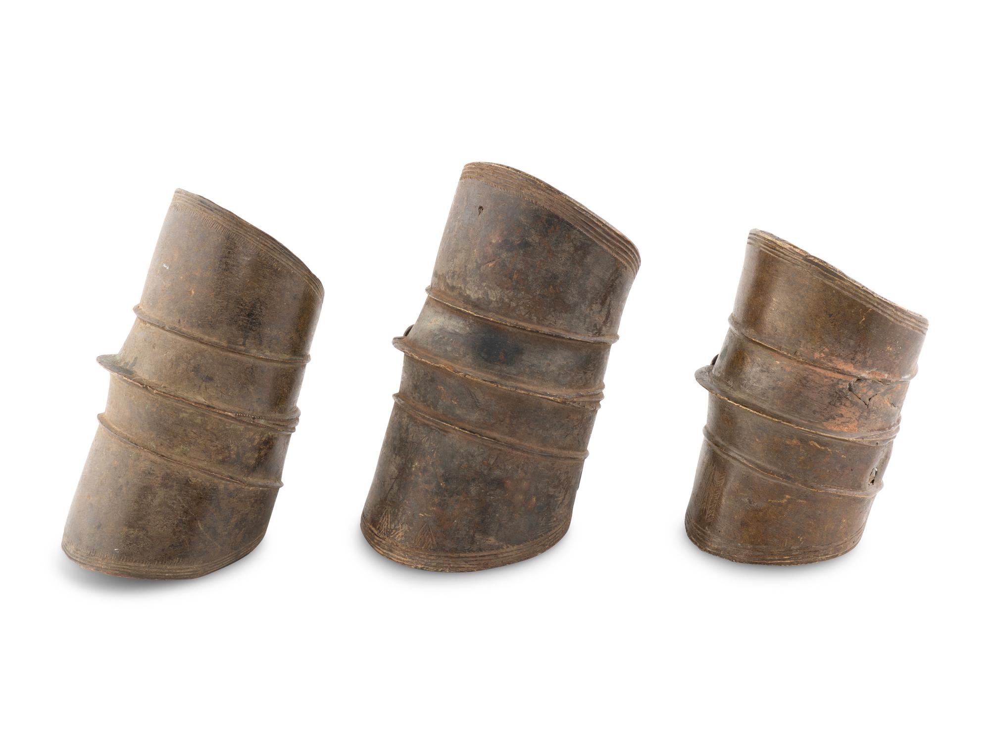 Three Bronze Cuffs