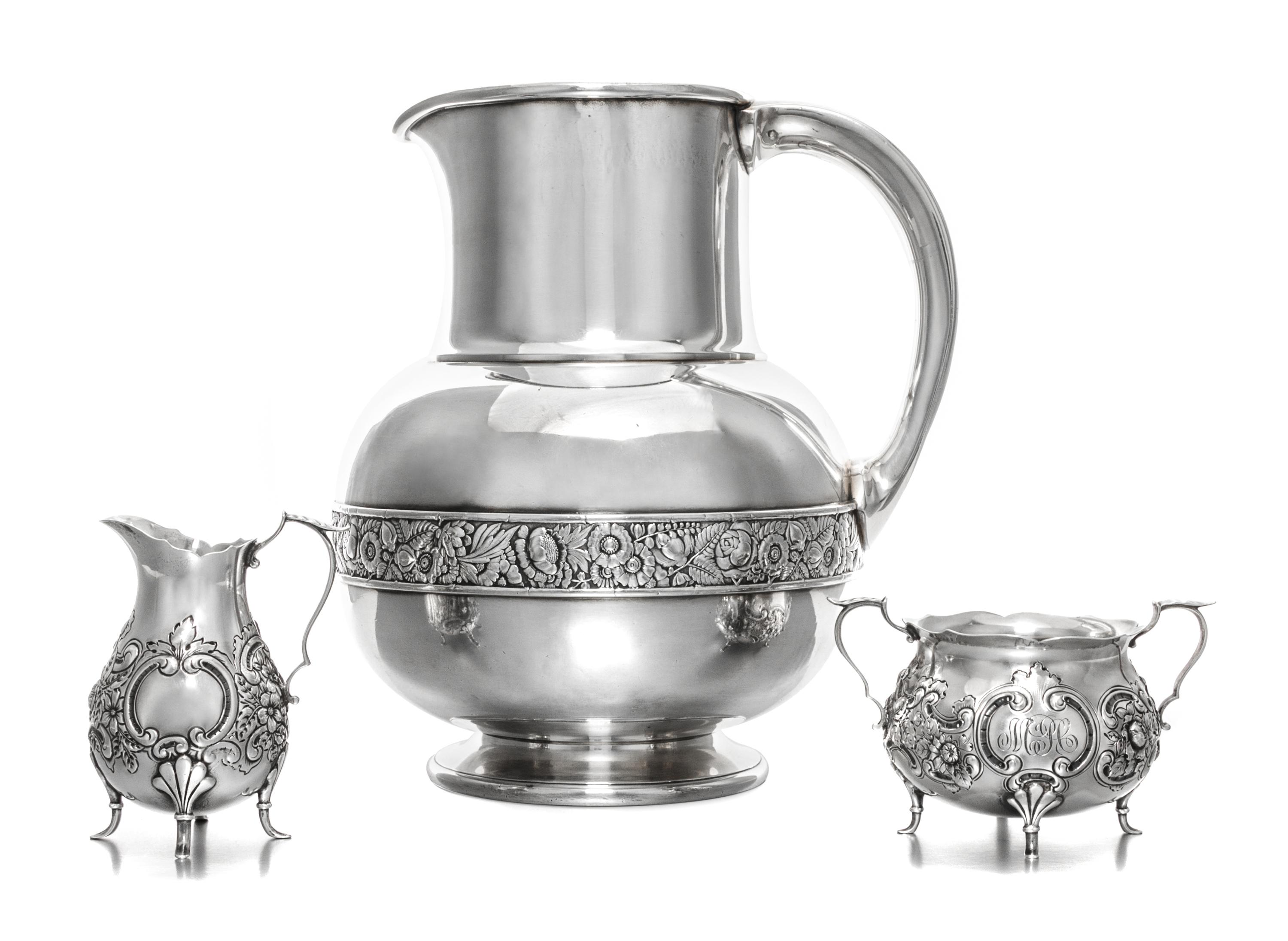 An American Silver-Plate Pitcher, Gorham Mfg. Co., Providence, RI, 1883, having a flattened spherical body with a cylindrical neck, the