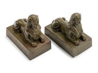 A Pair of Continental Patinated Metal Sphinxes