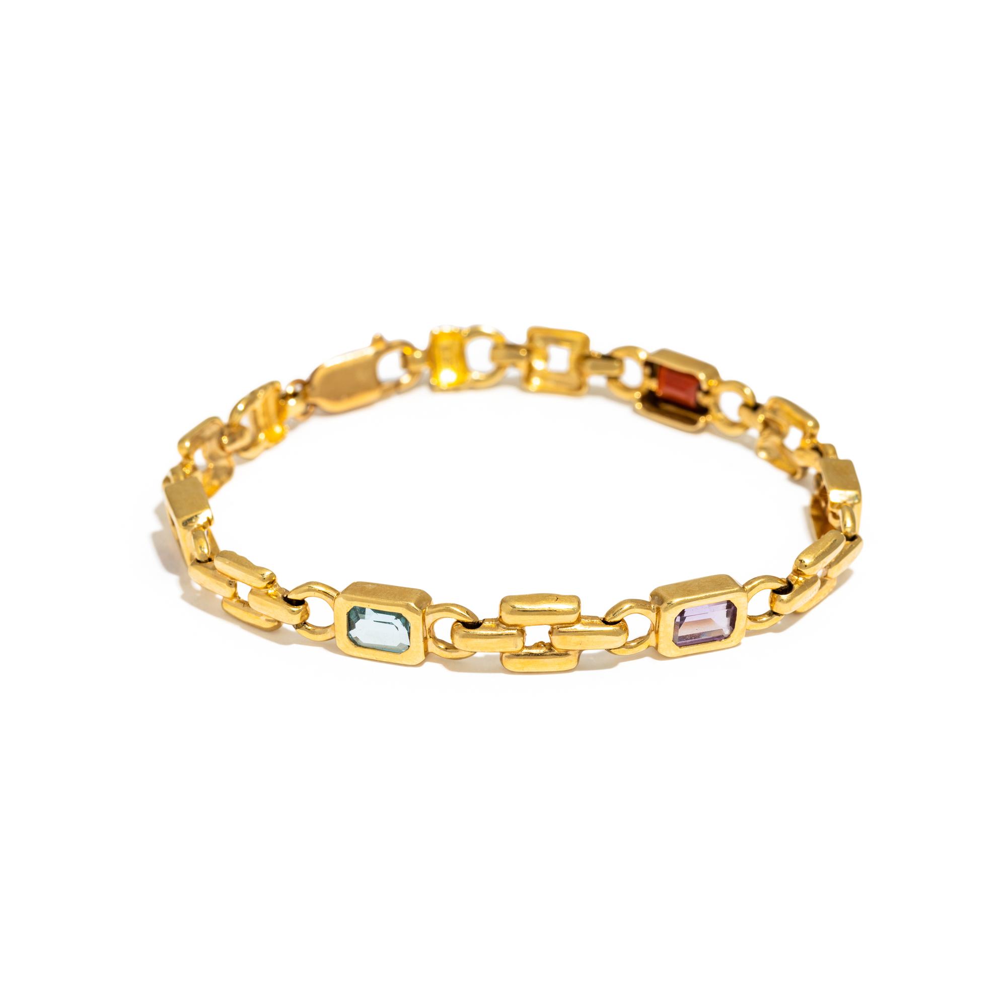 COLLECTION OF YELLOW GOLD AND MULTIGEM JEWELRY