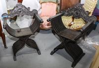 Two Renaissance Revival Savanarola Chairs Height 37 1/4 x width 28 x depth 19 1/2 inches. — 19TH CENTURY