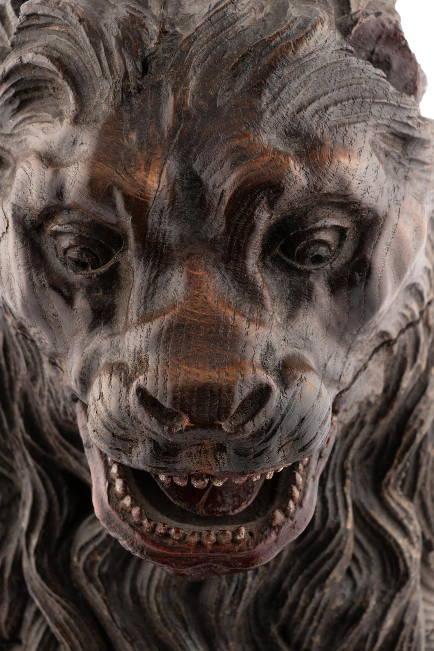 A Continental Carved Oak Lion