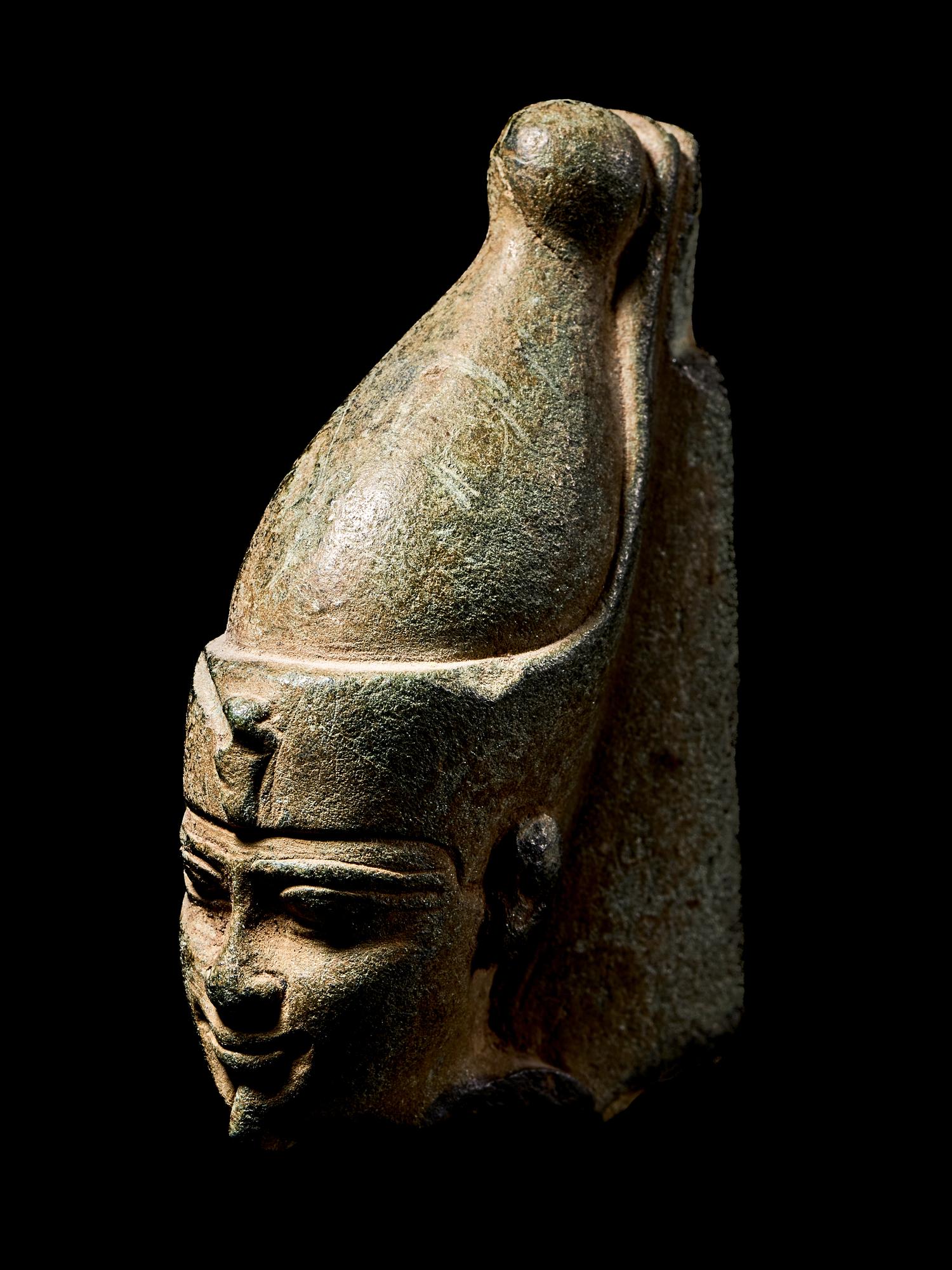 An Egyptian Steatite Head of Horus