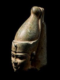 An Egyptian Steatite Head of Horus