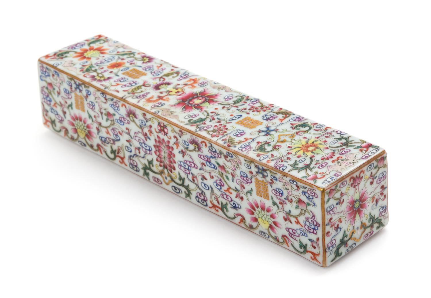 A Famille Rose Porcelain Paper Weight Length 8 1/2 inches.
