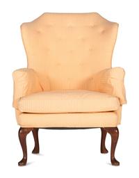 A Queen Anne Style Carved Walnut Upholstered Easy Chair