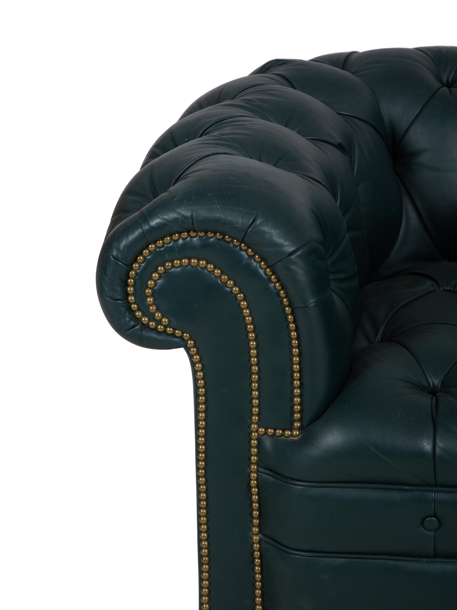 A Chesterfield Style Button-Tufted Leather Armchair