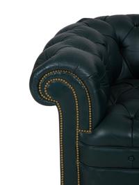 A Chesterfield Style Button-Tufted Leather Armchair