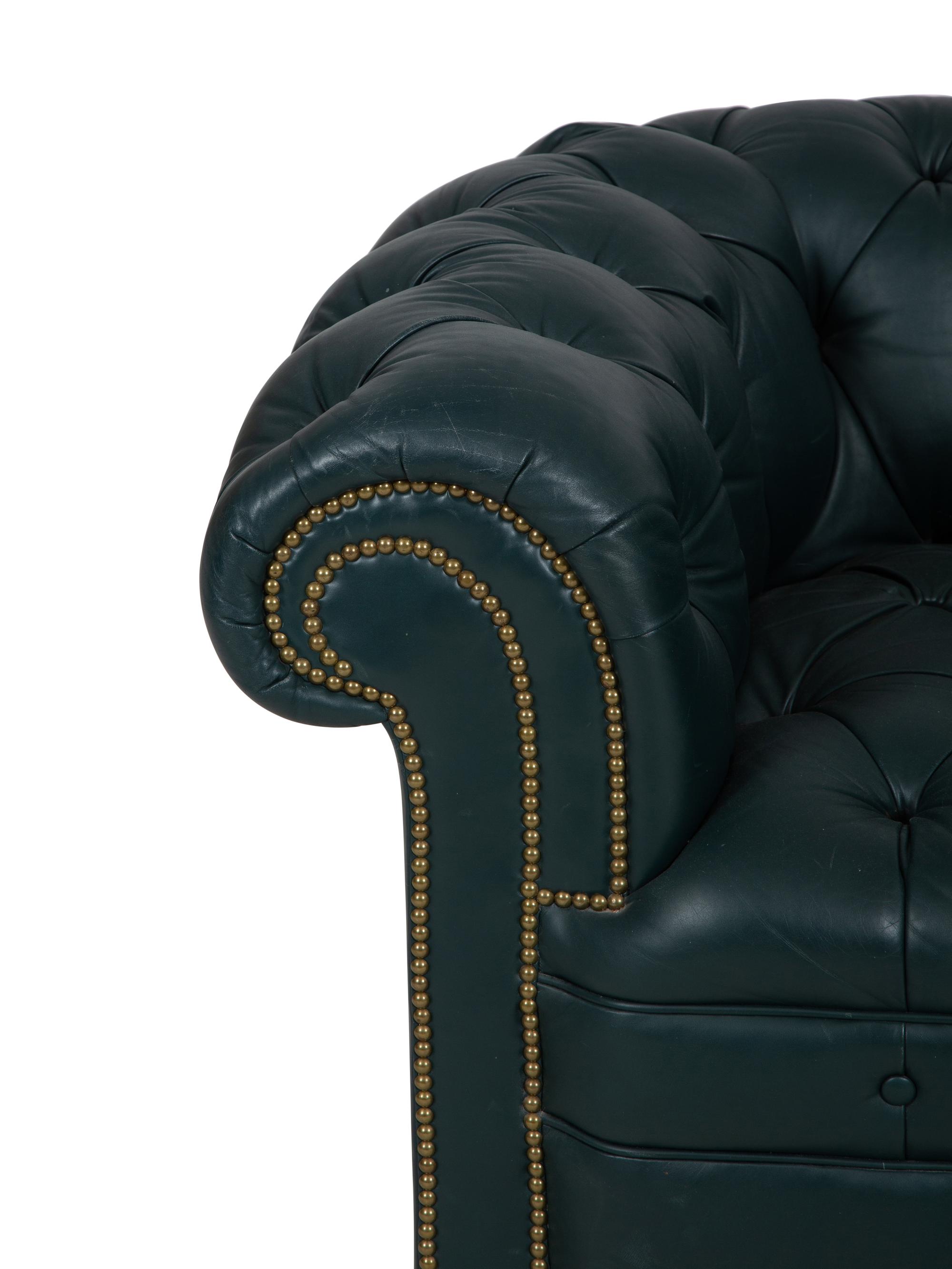A Chesterfield Style Button-Tufted Leather Armchair