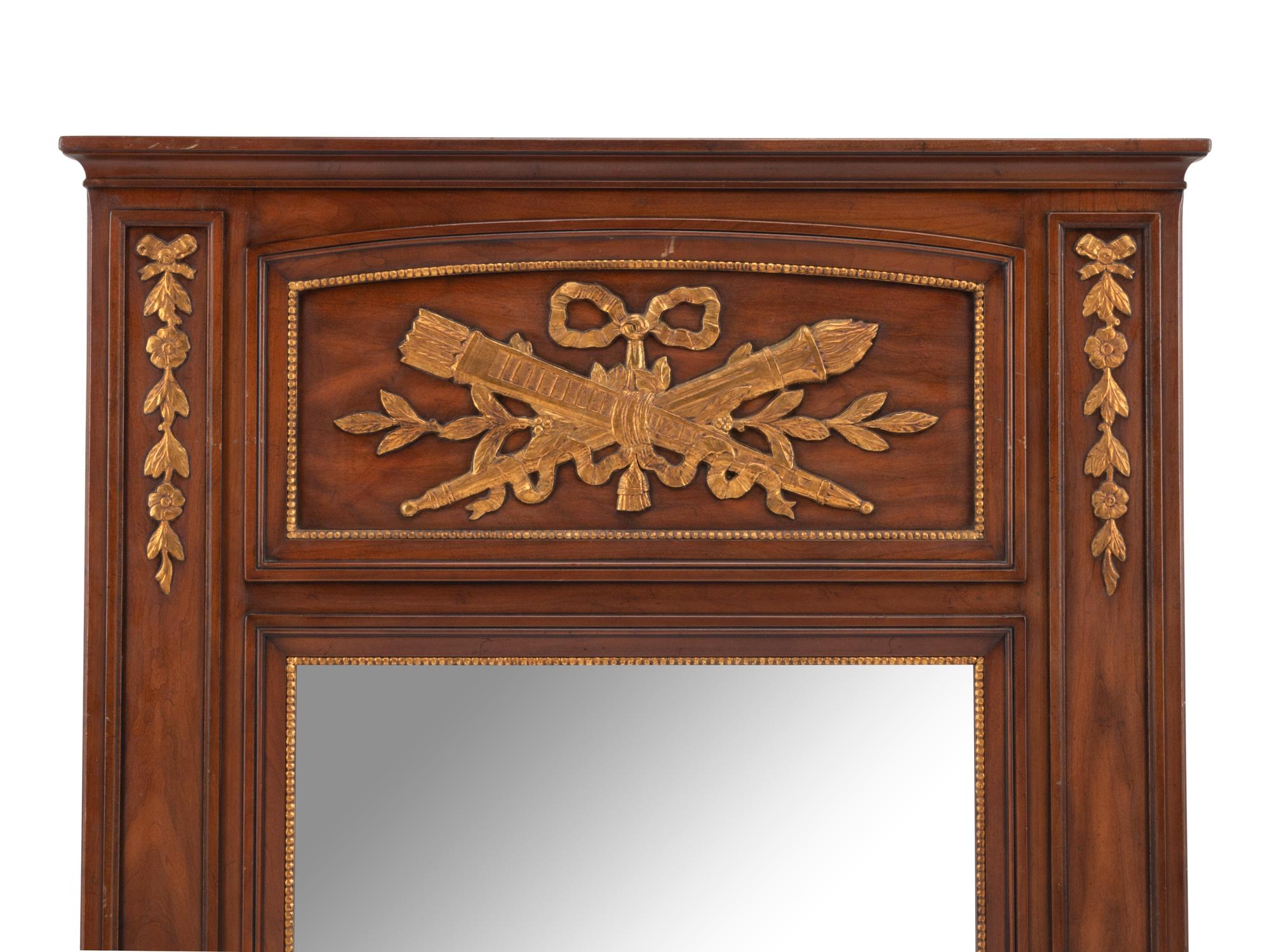 A Louis XVI Style Parcel Gilt Trumeau Mirror