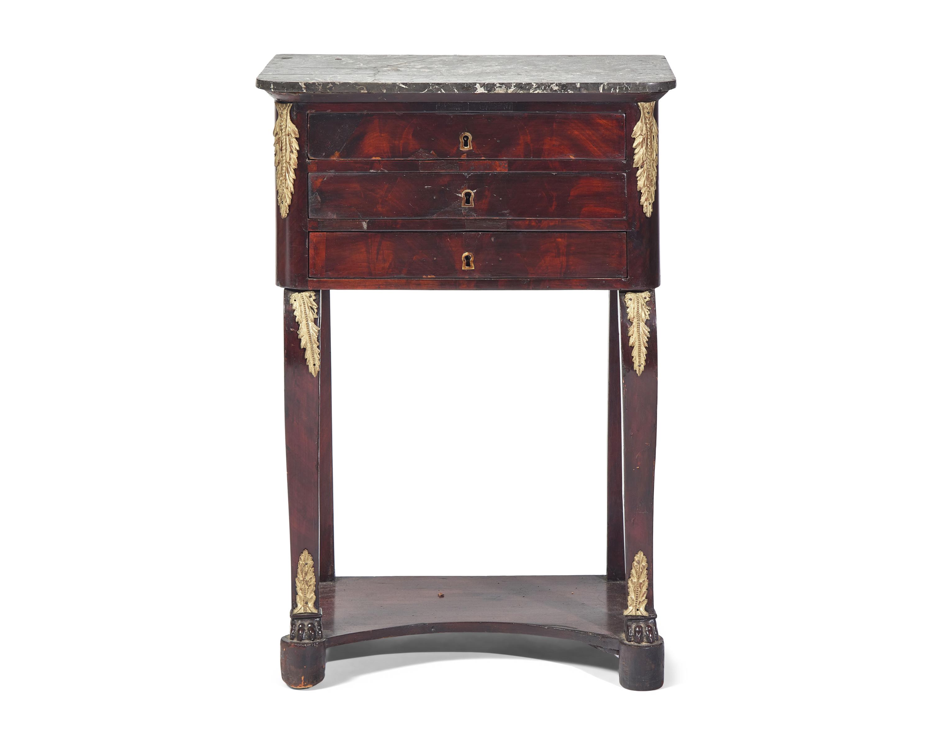 A French Louis Philippe Gilt Bronze-Mounted Mahogany Dressing Table With Marble Top