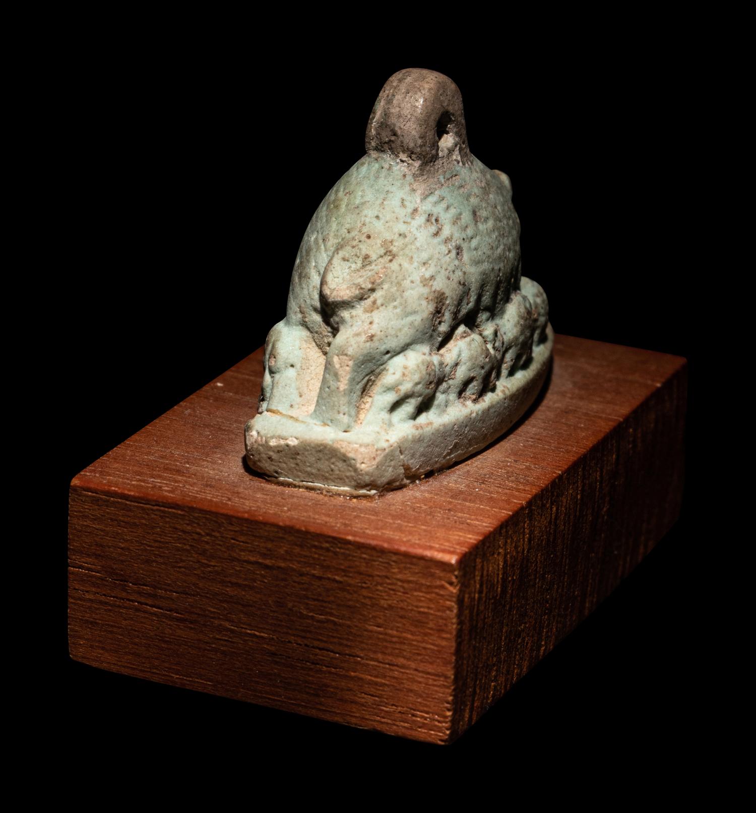 An Egyptian Faience Sow with Piglets