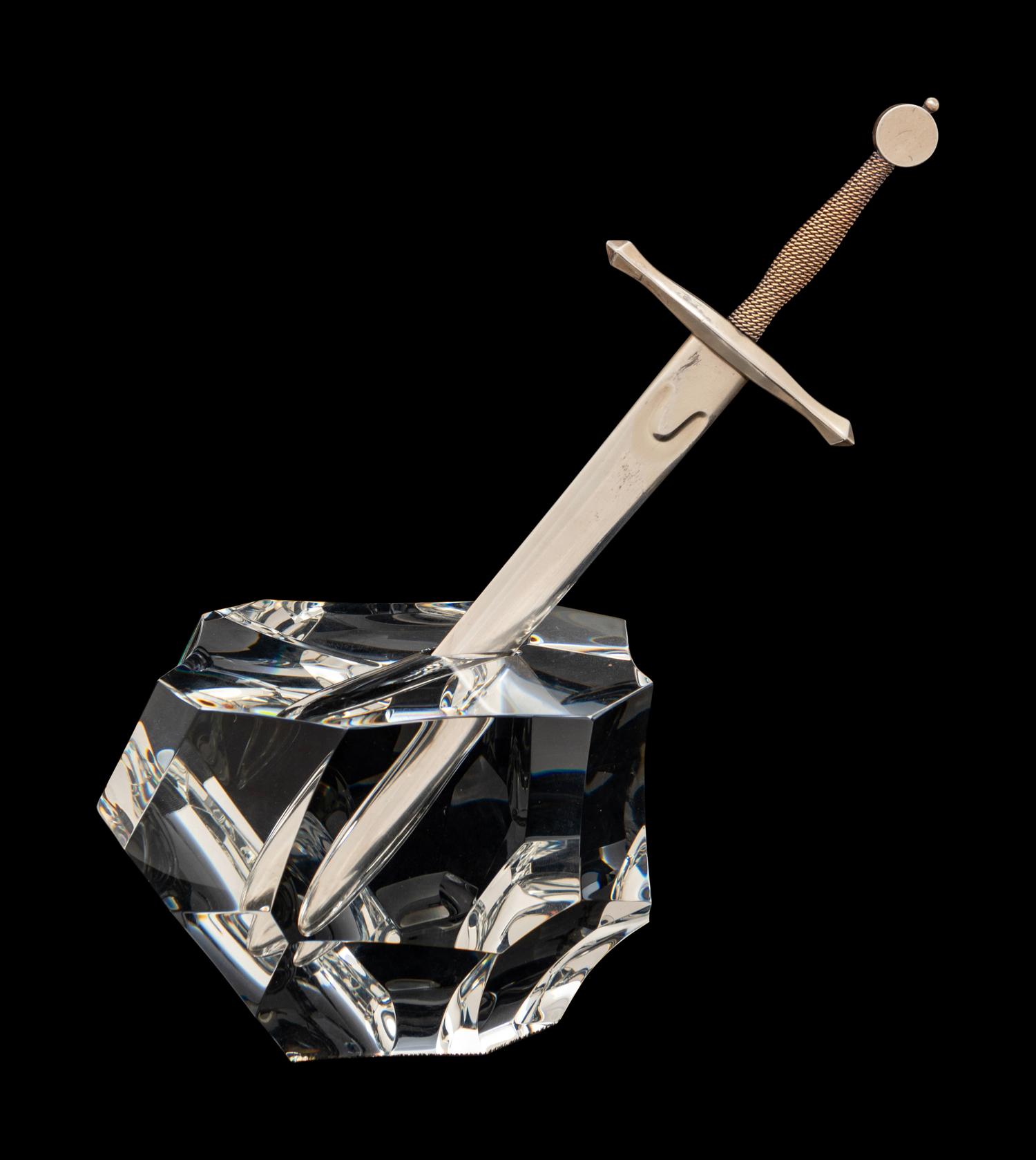A Steuben Excalibur Silver and Glass Paperweight