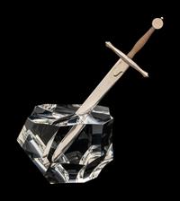 A Steuben Excalibur Silver and Glass Paperweight