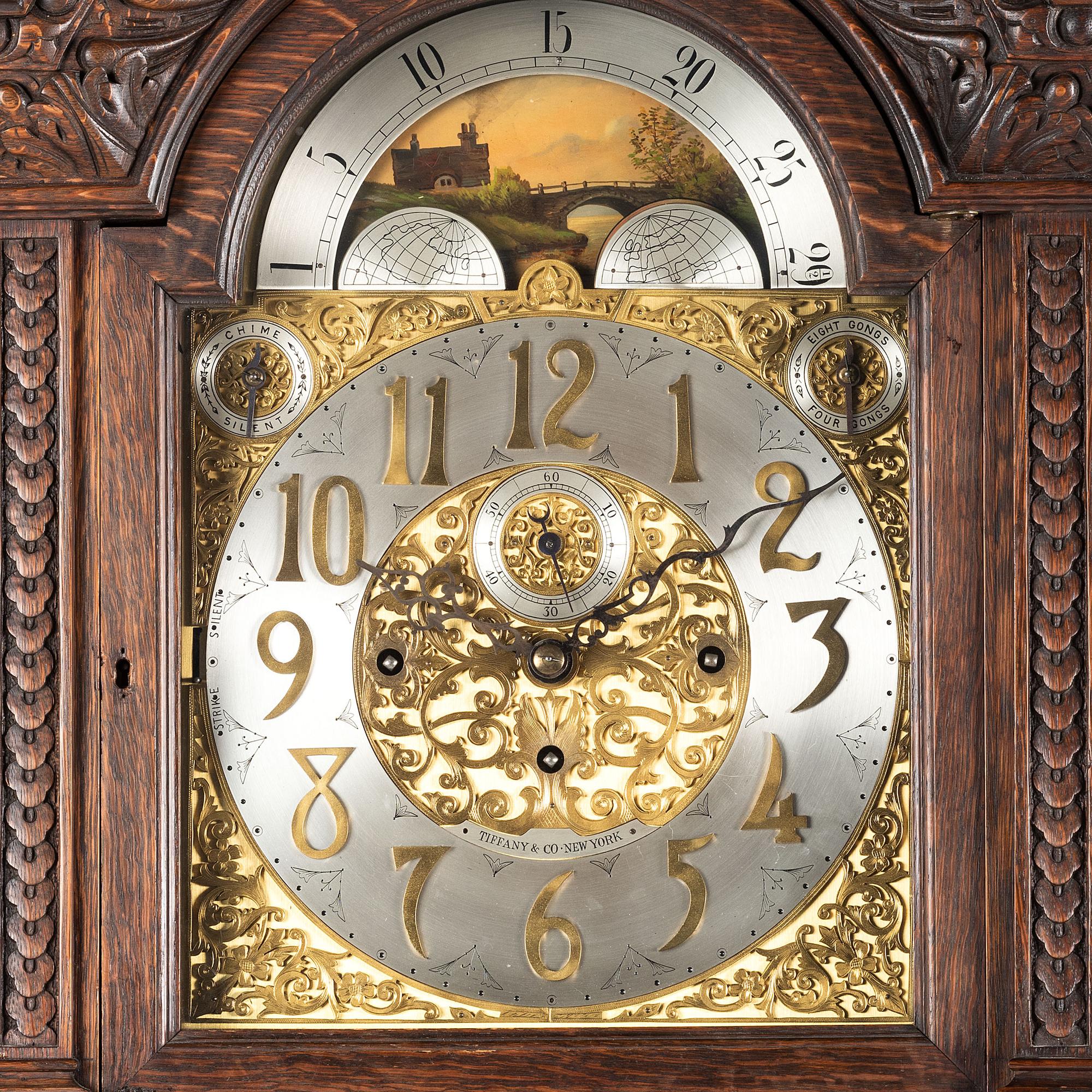A Renaissance Revival Carved Oak Tall Case Clock