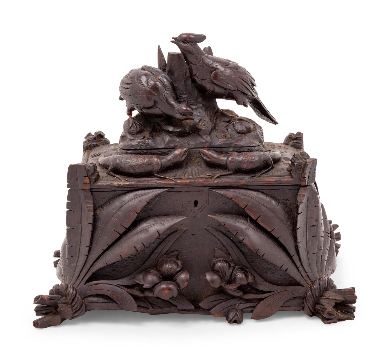 A Black Forest Carved Table Casket