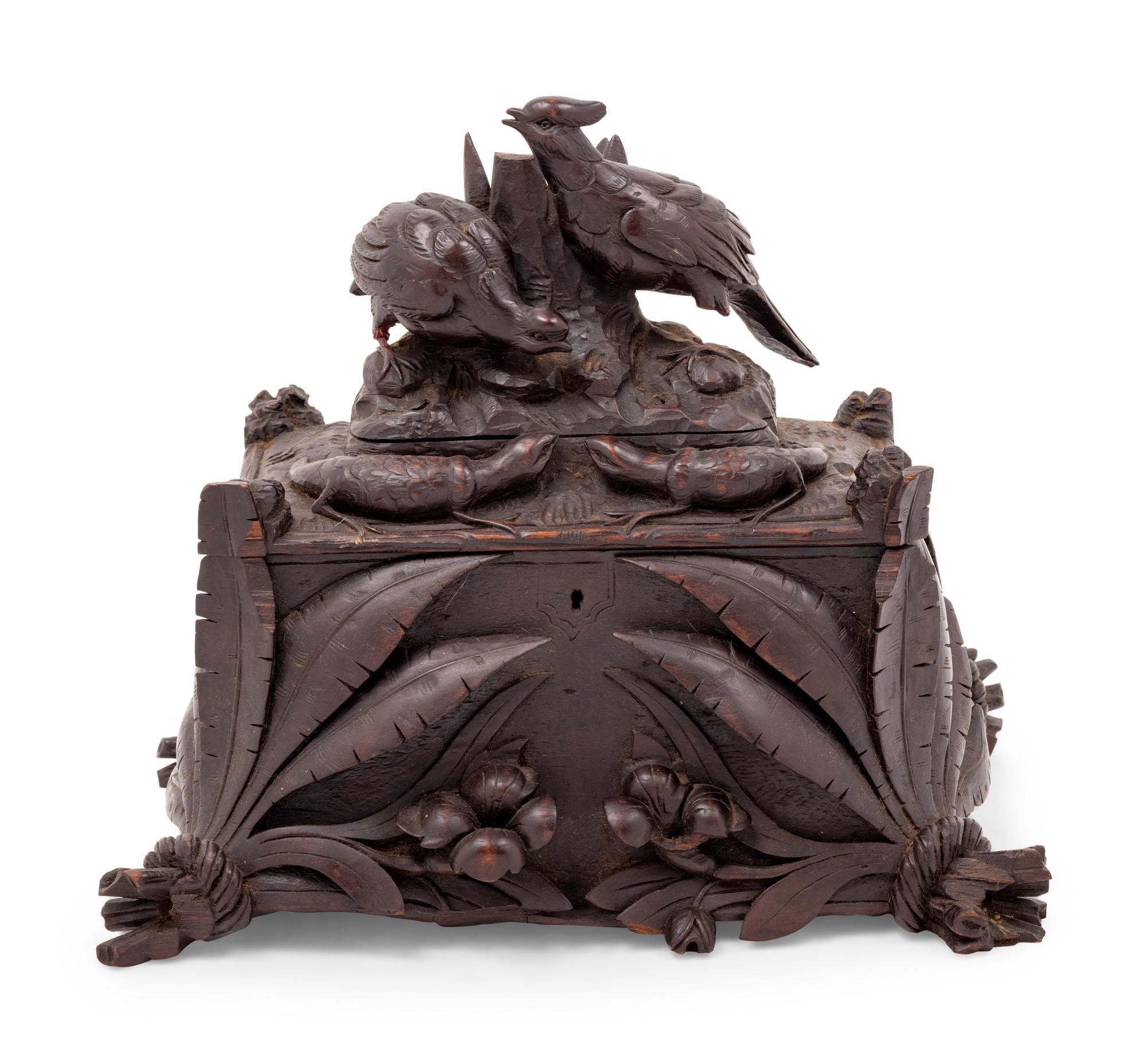 A Black Forest Carved Table Casket