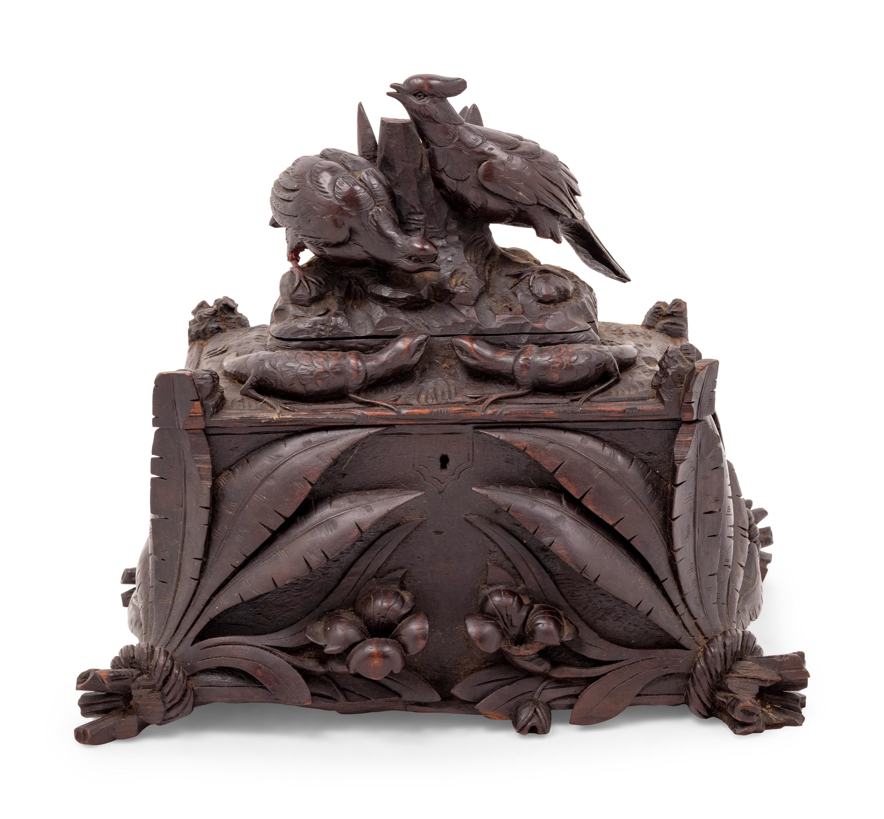 A Black Forest Carved Table Casket